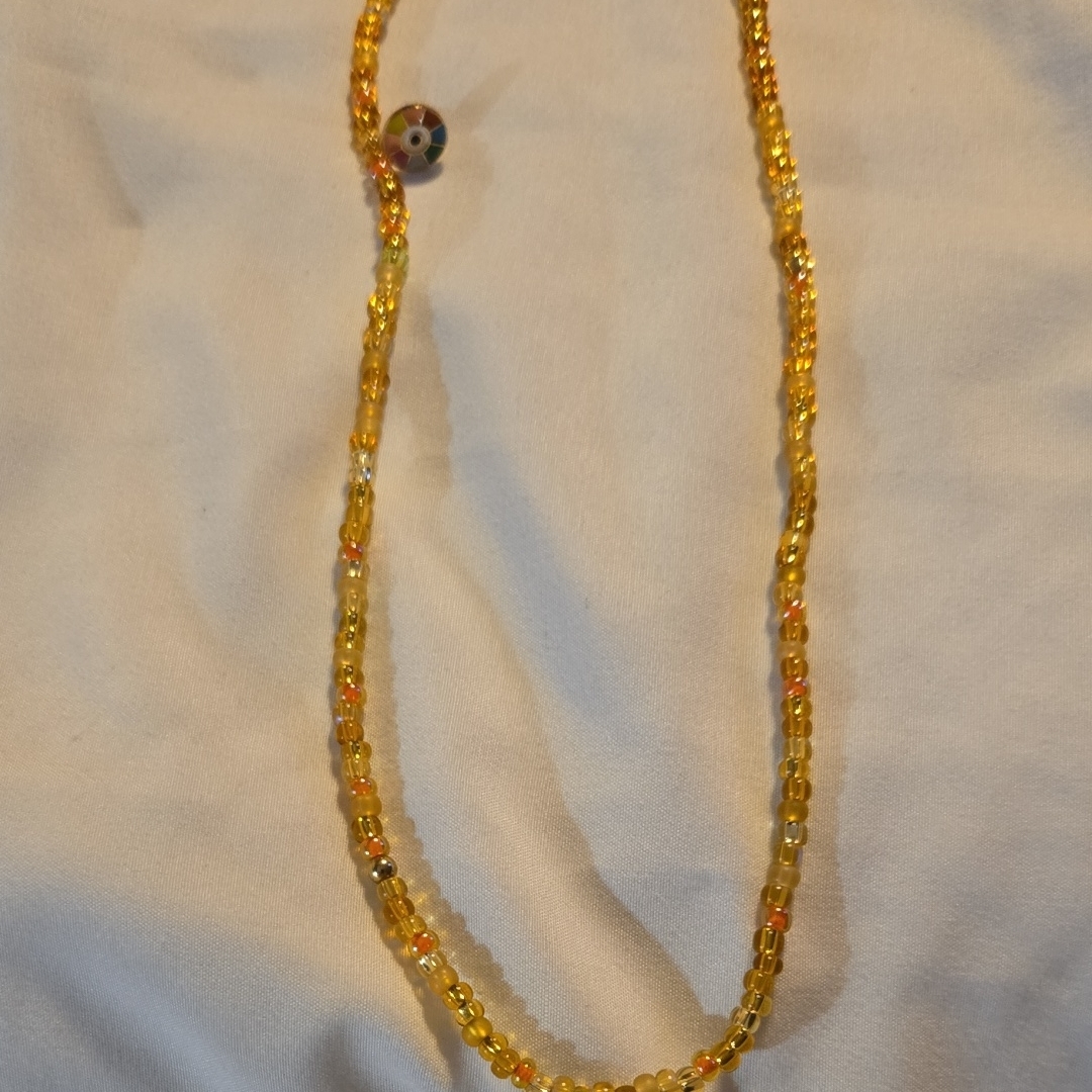 Elegant Beaded Necklace In Gold And Orange 25$